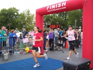 Leslie crossing the finish line